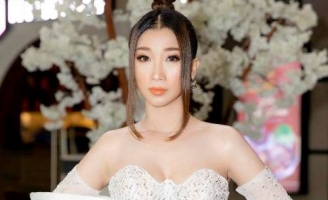 Hoa hậu Ngọc Liên diện đầm trắng khoe nhan sắc rạng rỡ