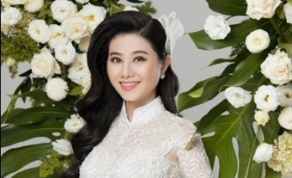 NSƯT Quế Trân duyên dáng với áo dài cưới của nhà thiết kế Minh Châu